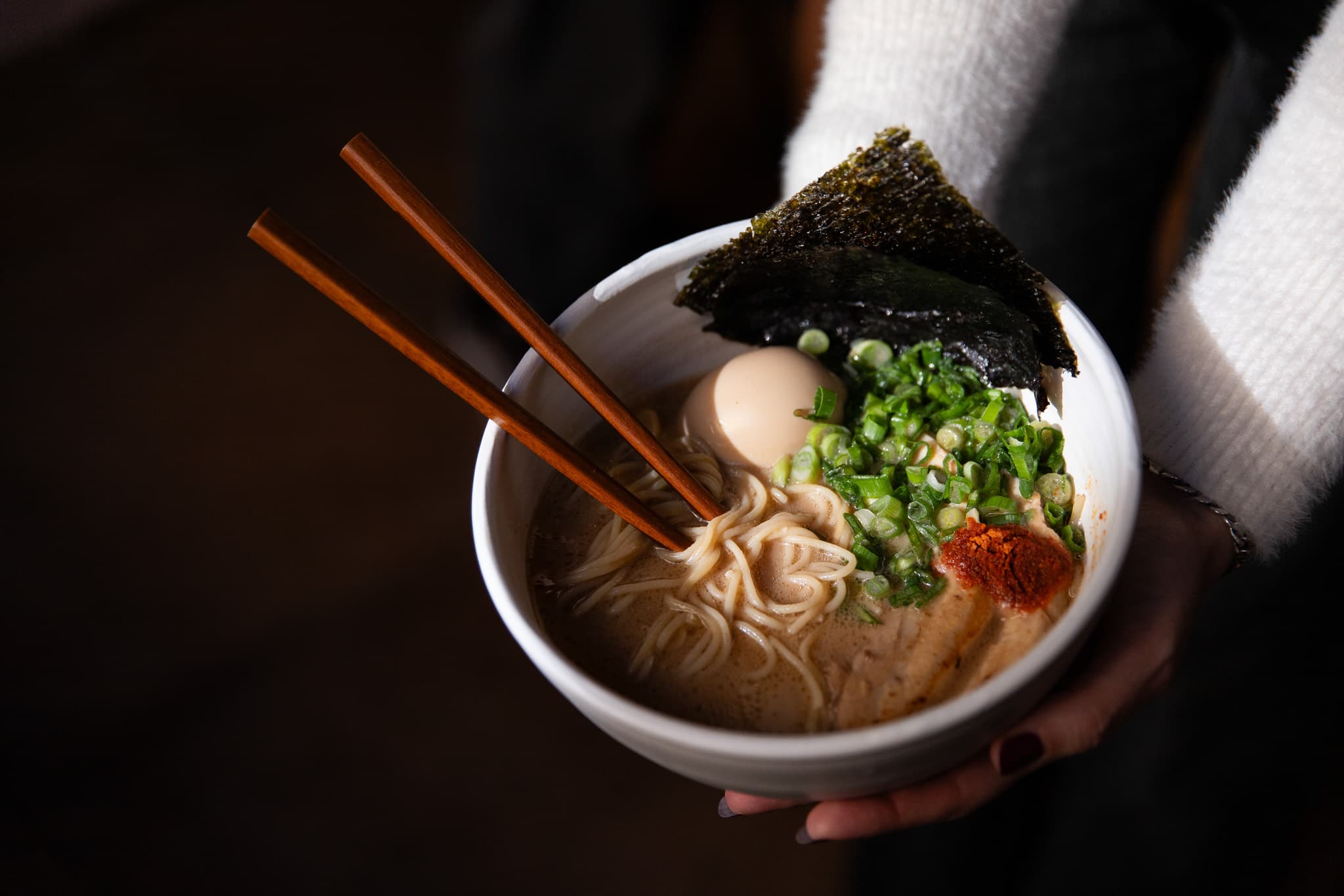 Bowl of ramen carried to the table